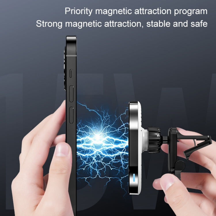 Magnetic car air outlet wireless charger bracket shown being held and aligned to vent