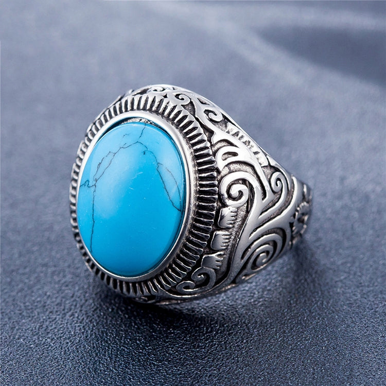 Men's titanium steel ring with blue oval turquoise-style gemstone and ornate bezel