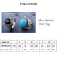 Men’s oval black gemstone ring with raised bezel and ornate silver pattern