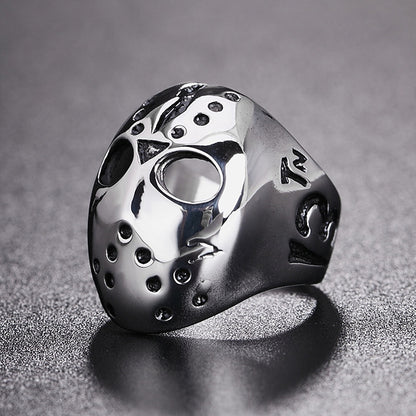 Skull mask ring with open eye cutouts and stud details, silver tone