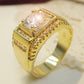 Gold-plated men’s diamond ring with round center stone in raised square bezel