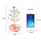 Rose gold tree-shaped jewelry organizer with bird charms and round earring tray