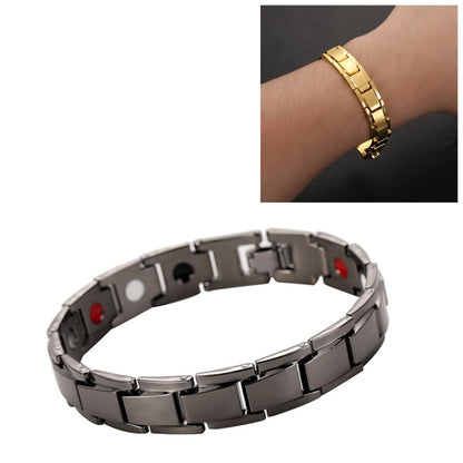 Men's titanium steel bracelet in black with gold-tone links and magnetic clasp