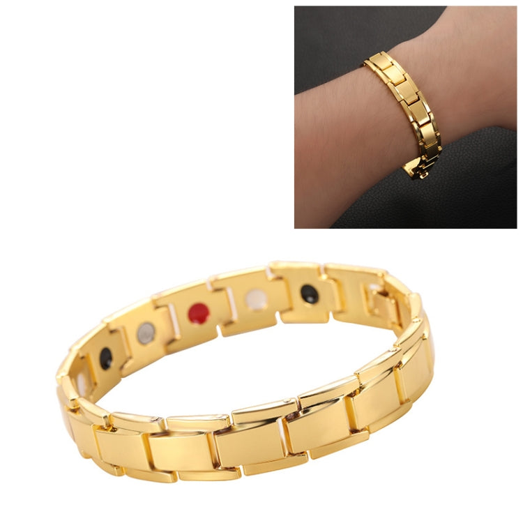 Men's magnetic bracelet with gold-tone metal links and red/black insets