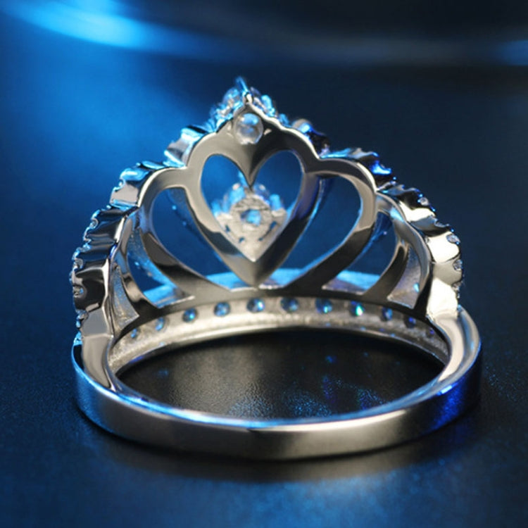 Crown-shaped zircon ring with heart motif top and small prong-set stones