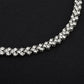 Silver crystal tennis bracelet close-up, continuous row of round rhinestones