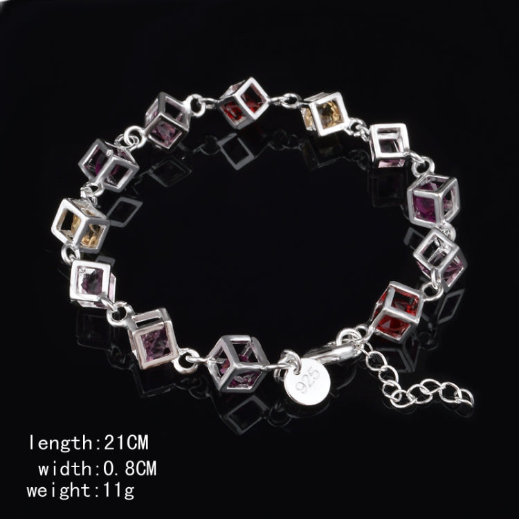 Silver rhinestone checker bracelet with heart charm and multicolor hollow square links.