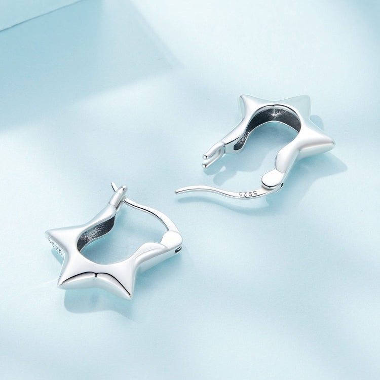 Pair of silver star ear clips with hinged backing and S925 stamp