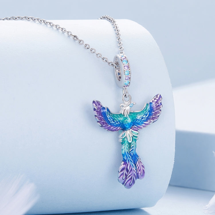 Sterling silver bracelet with colorful phoenix pendant charm, rainbow enamel wings