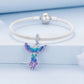 Silver mesh bracelet with dangling colorful phoenix charm in blue, purple, green enamel