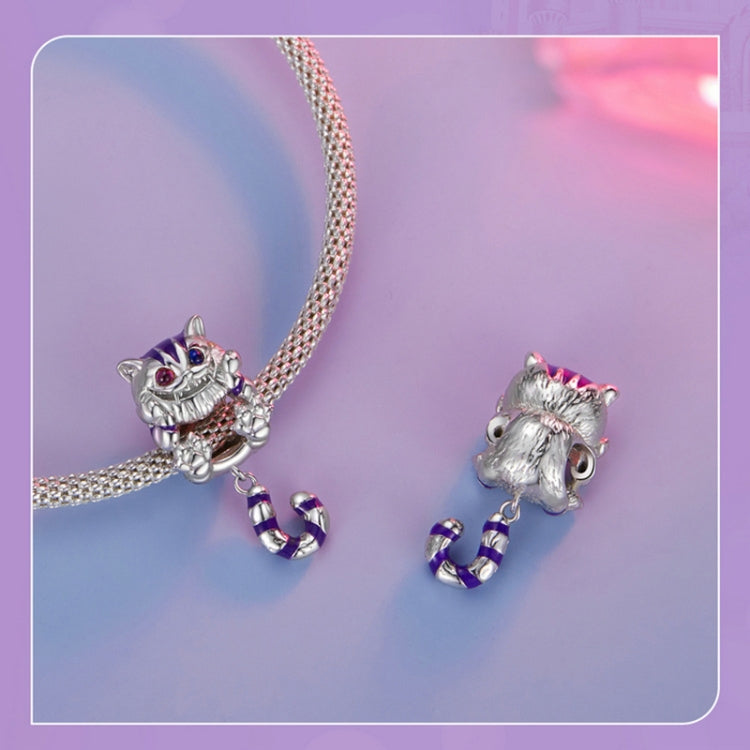 Silver cat charm with purple-blue eyes and striped details on a chain loop