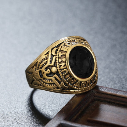 Men's gold-tone ring with carved soldier motif and black oval gemstone center.