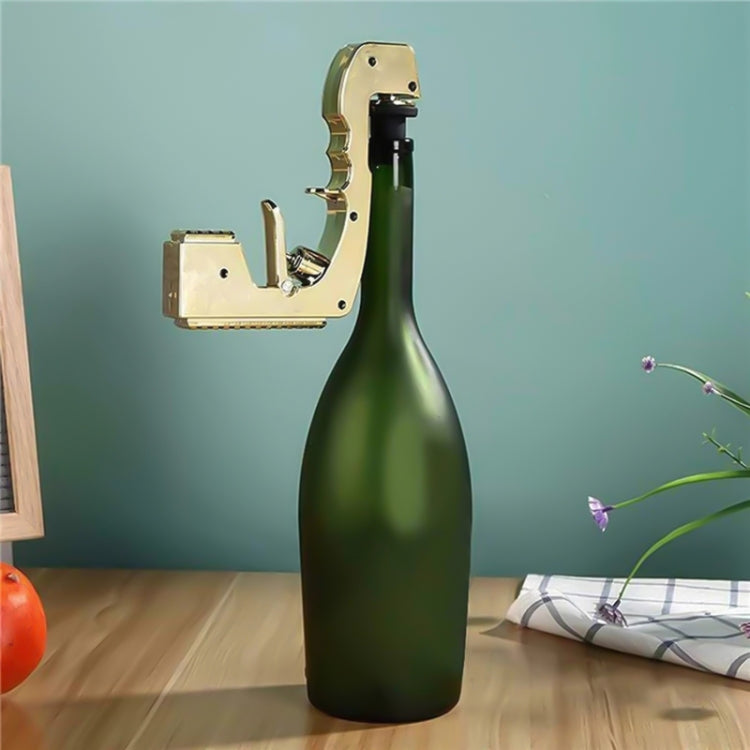 Bubble squirt gun attached to a green bottle on a tabletop
