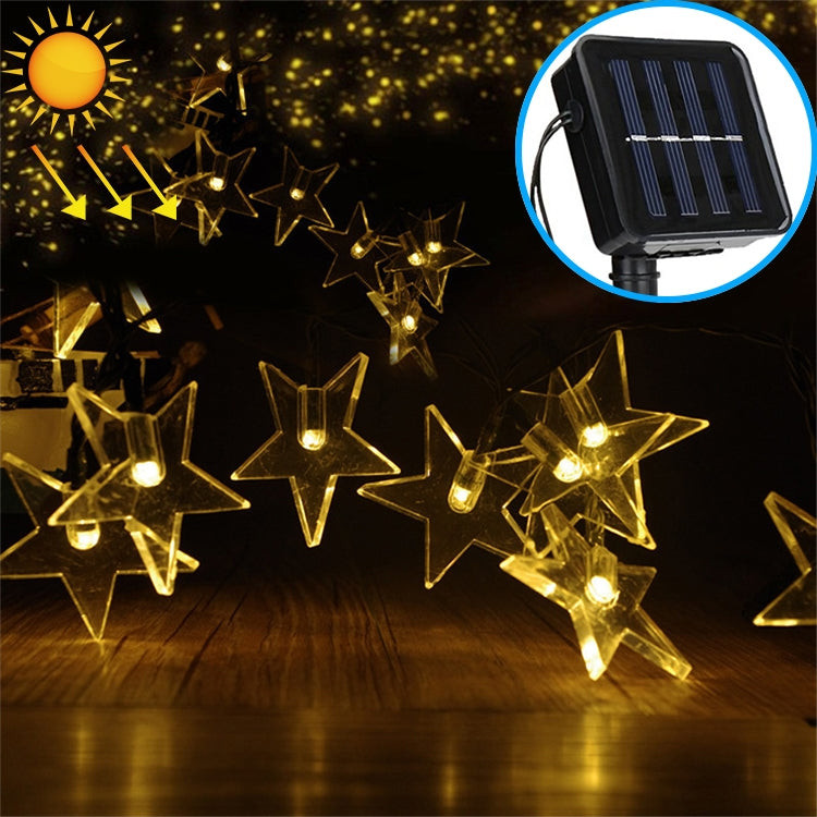 Solar-powered star LED string lights with warm yellow glowing star bulbs and solar panel