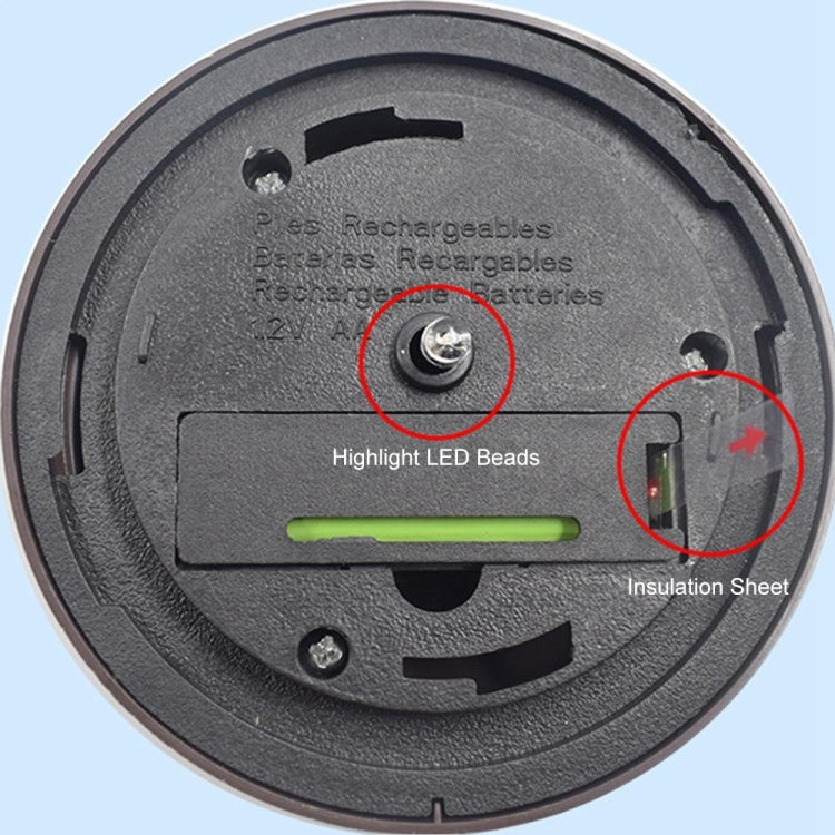 Round back of solar stake lamp with charging connector and insulation area