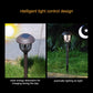 Solar stake garden lanterns on grass with lit lantern heads at night