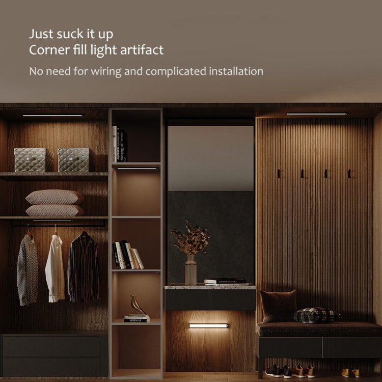 40cm cabinet LED light bar glowing, motion sensor on underside in closet corner