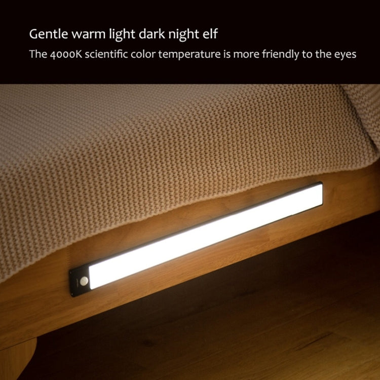 40cm LED cabinet light bar emitting warm white light under furniture edge