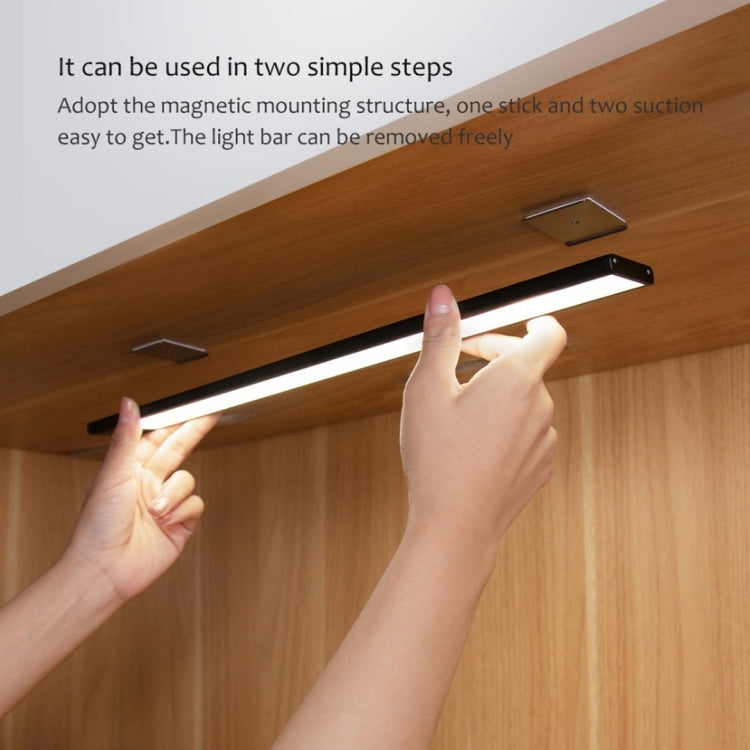 Rechargeable LED motion sensor light bar with hands installing under cabinet, 40cm