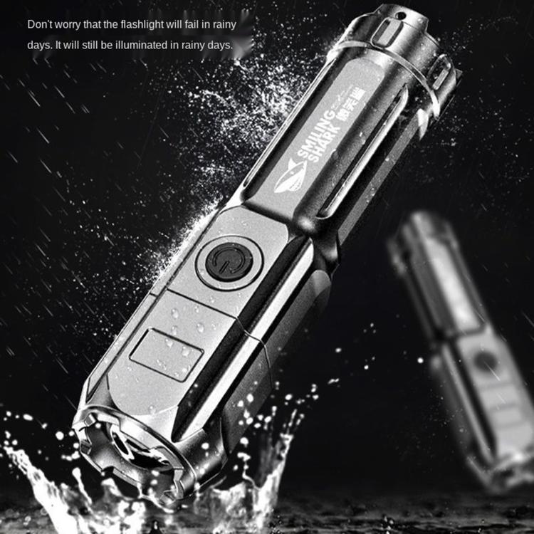 Silver waterproof-style flashlight shown with water splash and side power button.
