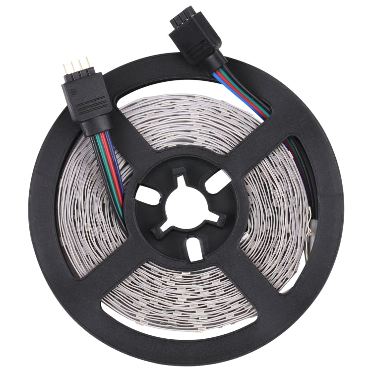 RGB LED rope light reel with three-color wire leads and bare circuit strip
