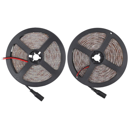 Dimmable LED rope light reel set with bare circuit boards on gray spools and red wire leads