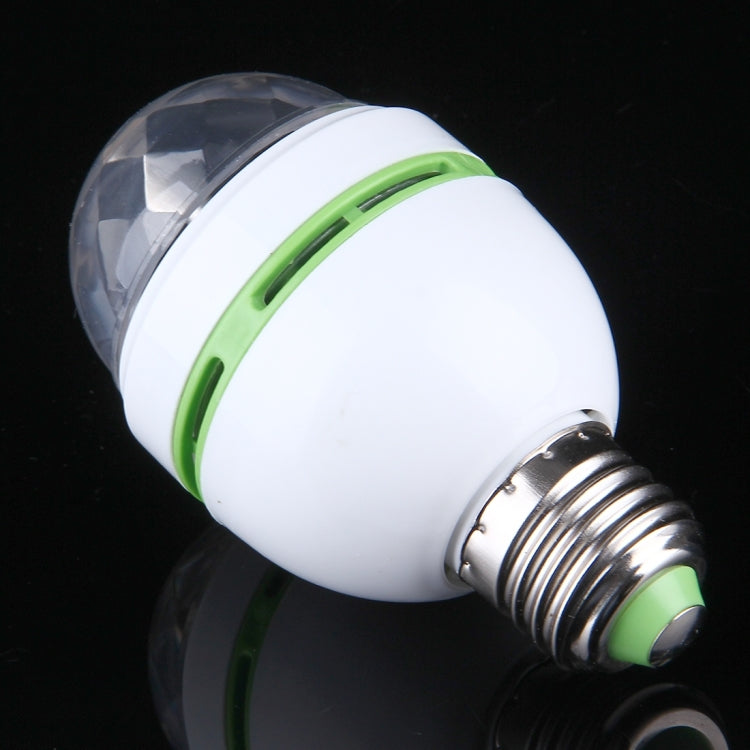 E27 LED bulb angled view with faceted clear lens, white housing and green collar
