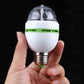 E27 LED bulb held in hand with faceted clear top, white body and green vent band