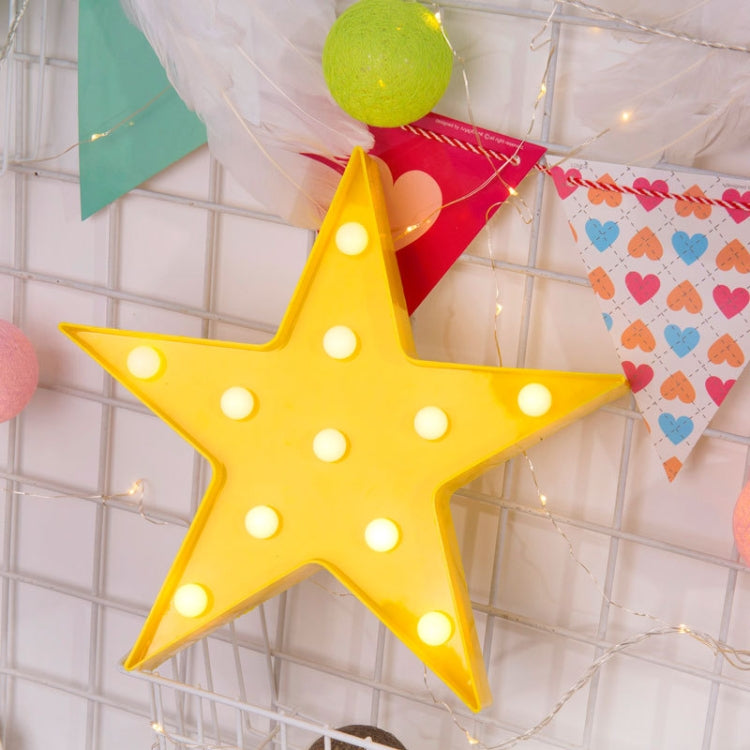 Yellow LED pentagram night light star with warm glowing bulbs