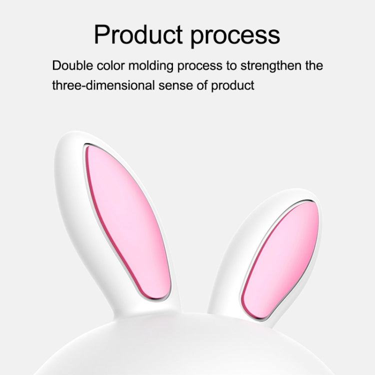 White silicone bunny LED lamp with pink ear interiors, close-up of ears