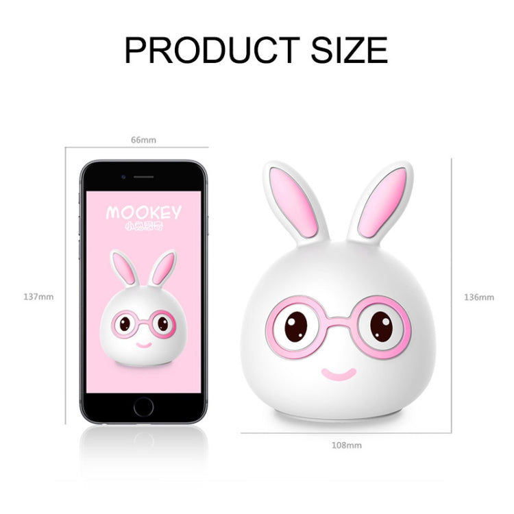 Bunny LED lamp with pink glasses and ears, size view with smartphone comparison