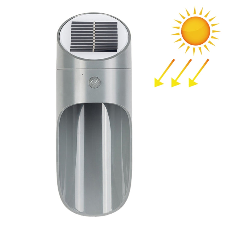Gray solar LED wall light with round top solar panel and front motion sensor window
