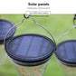 Solar panel top of hanging conical garden lamp with round black housing