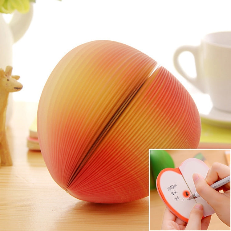 Peach-shaped note sticker with orange-red pleated paper design, plus close-up writing insert