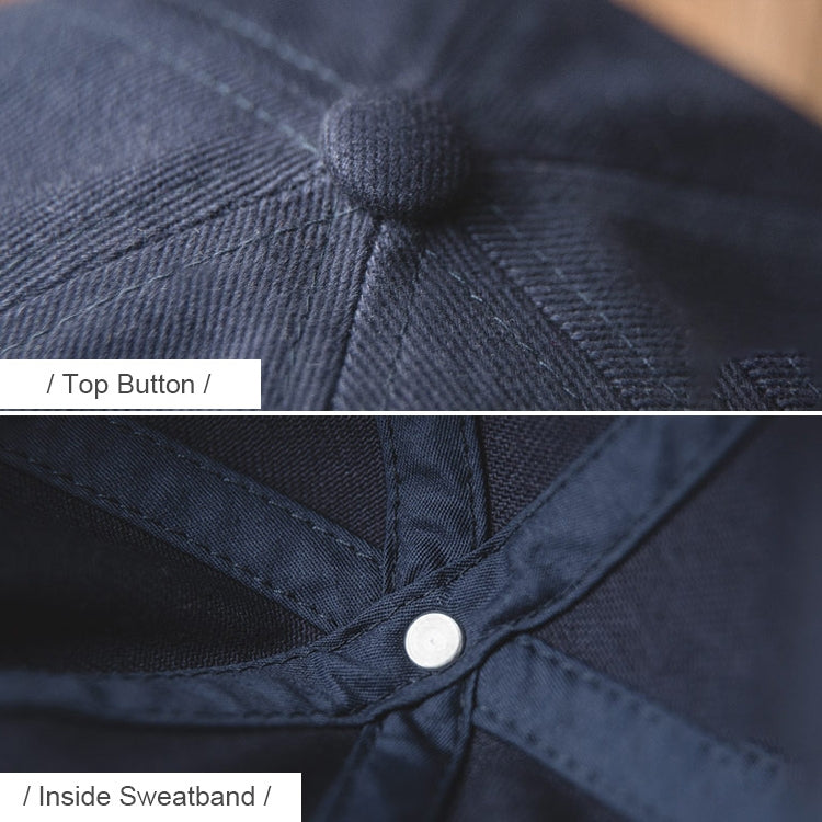 Navy beanie cap with top button and inside sweatband stitching detail