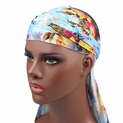 Floral printed headscarf pirate hat with long trailing tail, elastic fit