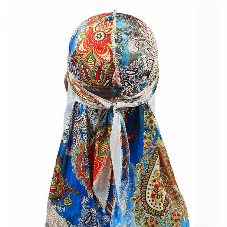 Printed headscarf cap with long flowing ties, multicolor ornate pattern and elastic band