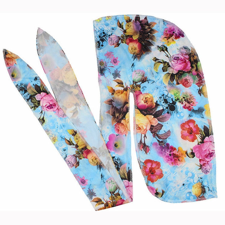 Blue floral print long-tail headscarf with matching headband and tied fabric ends
