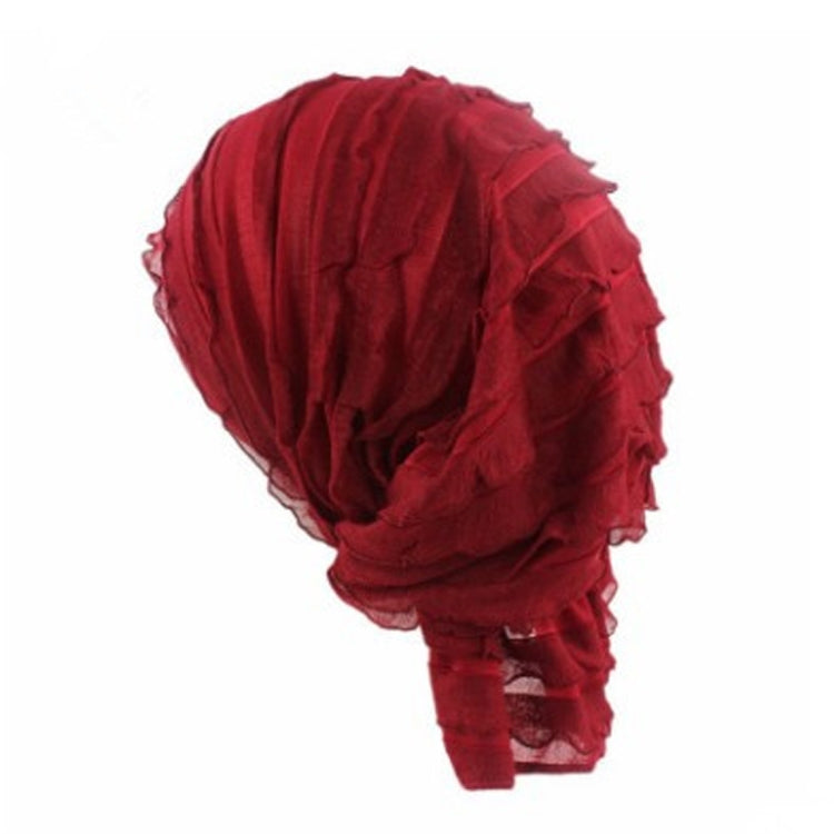 Red chiffon fold turban cap viewed from the back with stacked pleated texture