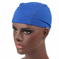 Sapphire blue elastic dome wig cap on a mannequin head, stitched seam details