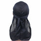 Dark long-tailed headscarf hat with gathered fabric and tied back tails