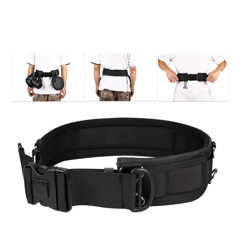 Black wide belt with side clips and dual strap loops, shown worn on a white shirt