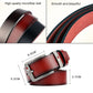 Leather belt with silver pin buckle and smooth surface, red-brown strap close-up