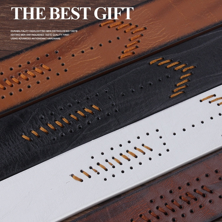 Black and brown retro leather belt close-up with perforations and contrast stitching