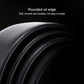 Black leather belt edge close-up with rounded oil-finished surface