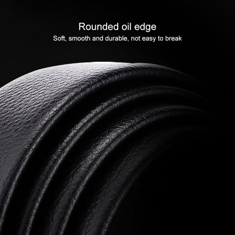 Black leather belt edge close-up with rounded oil-finished surface