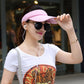 Pink visor cap with curved brim, sporty lightweight design for outdoor use.