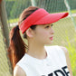 Red visor cap with curved brim and lightweight textured fabric for sun coverage.