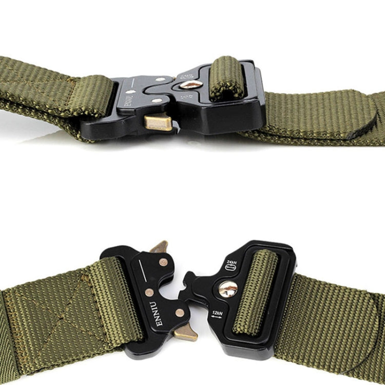 Olive nylon belt with black multi-function buckle and metal prongs, close-up