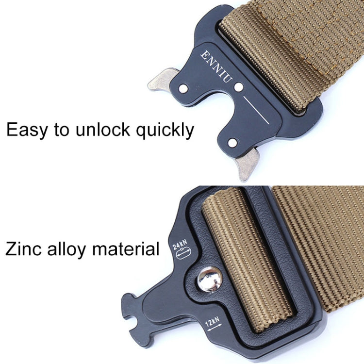 Tactical belt close-up with tan webbing and black quick-release buckle hardware